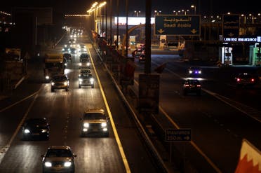 Vehicles travel into Bahrain from Saudi Arabia at King Fahd causeway. (File photo: AP)