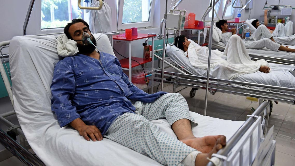 A wounded staff member of Doctors Without Borders and a survivor of the U.S. airstrikes on their hospital in Kunduz, receives treatment at an emergency hospital in Kabul. (AFP)