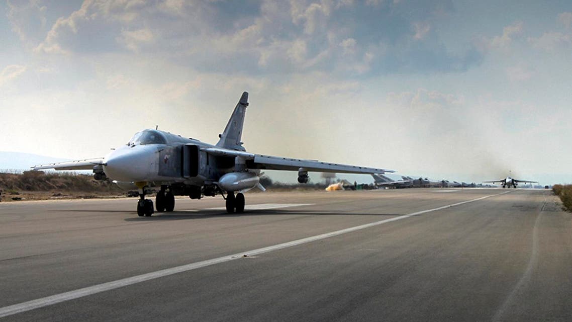 A Russian SU-24M jet fighter prepares to take off from an airbase Hmeimim in Syria. (AP)