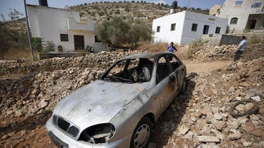 A car belonging to Palestinian residents, which some said was burnt by alleged Jewish settlers, in the occupied West Bank. (Reuters)