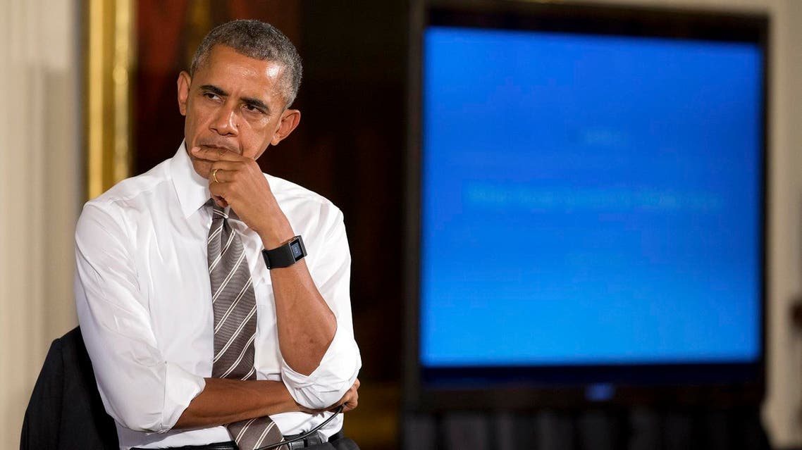 President Barack Obama attends a conversation co-hosted by Coworker.org during the White House Summit on Worker Voice. (AP)