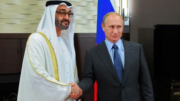 Russian President Vladimir Putin and the Crown Prince of Abu Dhabi Mohammed bin Zayed Al Nahyan shake hands during their meeting in the Bocharov Ruchei residence in Sochi, Russia, Thursday, Oct. 23, 2014. (AP