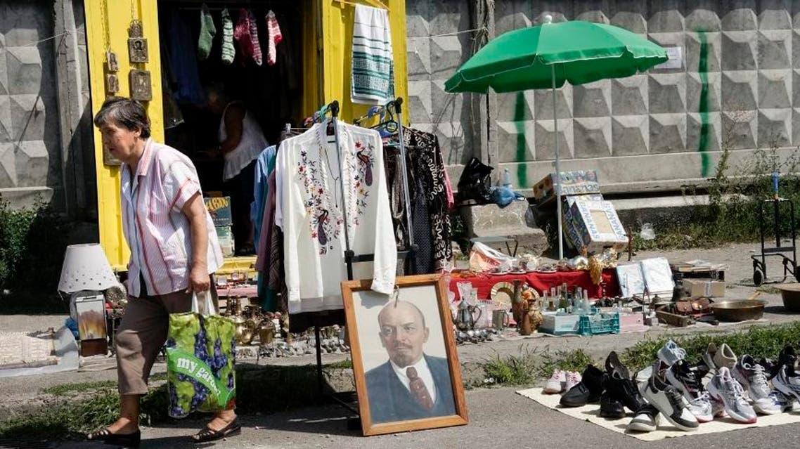 Lenin’s portrait is for sale at a market in Ukraine’s capital Kiev, where people were in August selling their belongings in an attempt to survive in a financial crisis. (AP Photo)
