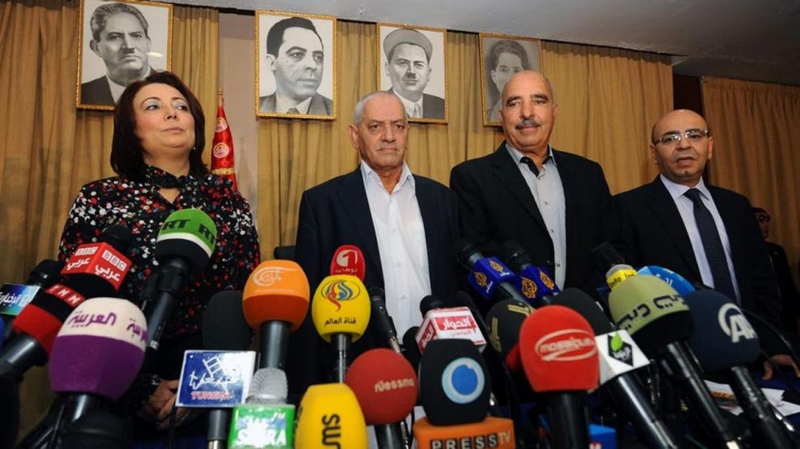 A photo taken on September 21, 2013 shows Tunisian mediators (LtoR) the President of the Tunisian employers union (UTICA), Wided Bouchamaoui, Secretary General of the Tunisian General Labour Union (UGTT) Houcine Abbassi (L) , President of the Tunisian Human Rights League (LTDH), Abdessattar ben Moussa and the president of the National Bar Association, Mohamed Fadhel Mahmoud at a press conference in Tunis. AFP