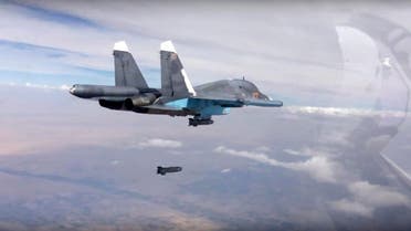 In this photo made from the footage taken from Russian Defense Ministry official web site on Friday, Oct. 9, 2015, a bomb is released from Russian Su-34 strike fighter in Syria. (AP)