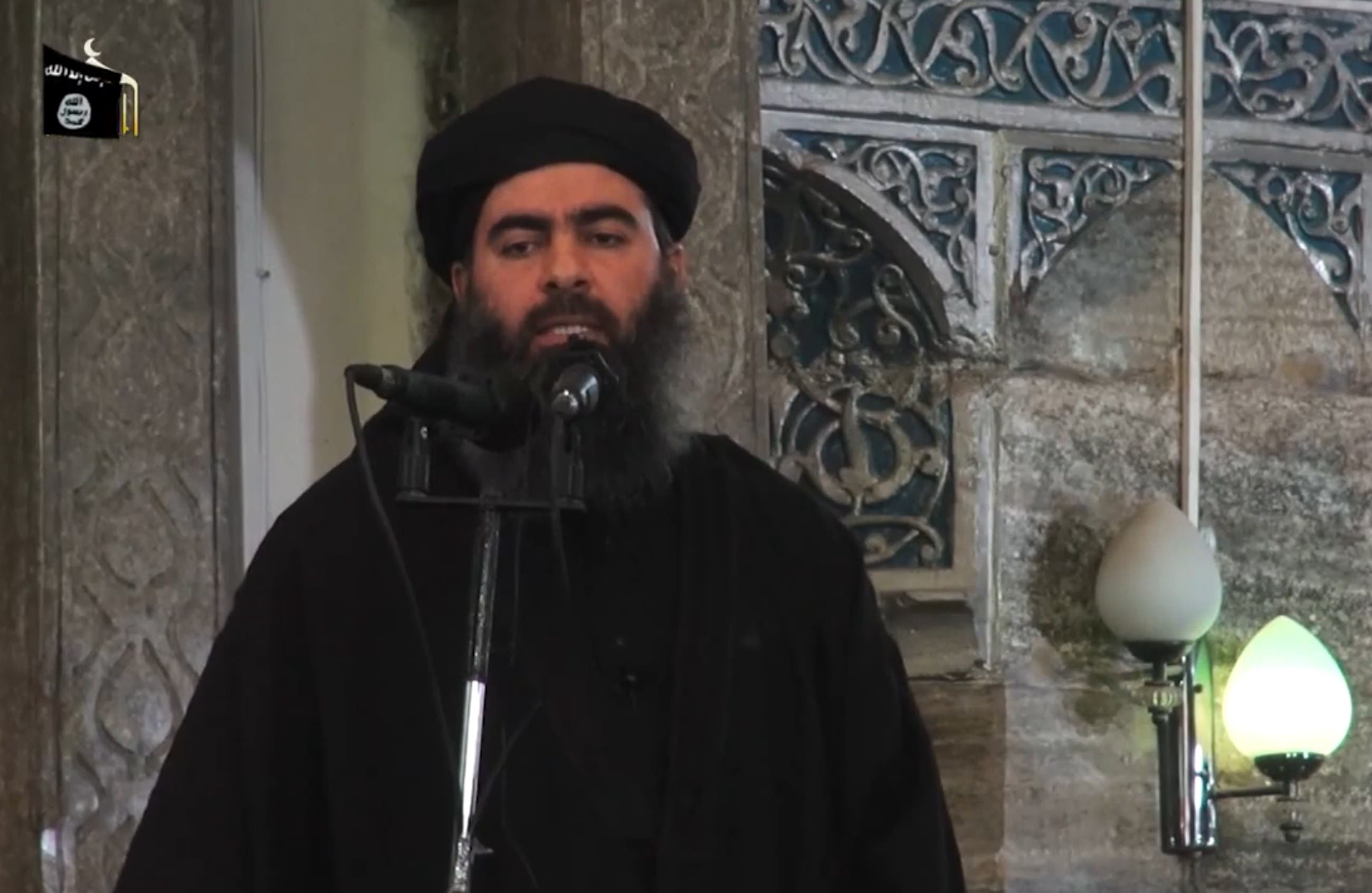 An image grab taken from a propaganda video released on July 5, 2014 by al-Furqan Media allegedly shows the leader of the Islamic State (IS) jihadist group, Abu Bakr al-Baghdadi afp