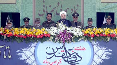 Iranian President Hassan Rouhani (C) delivers a speech as military commanders attend a parade marking the anniversary of the Iran-Iraq war (1980-88), in Tehran September 22, 2015. (Reuters)