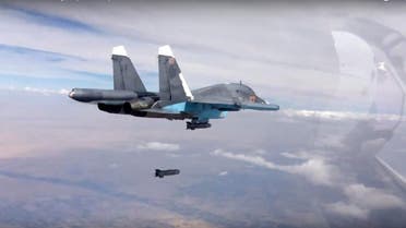 In this photo made from the footage taken from Russian Defense Ministry official web site on Friday, Oct. 9, 2015, a bomb is released from Russian Su-34 strike fighter in Syria. AP