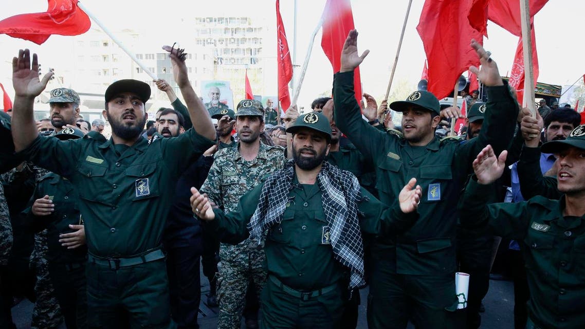 A group of Iranian Revolutionary Guard members mourn during the funeral ceremony of Gen. Hossein Hamedani in Tehran. (File photo: AP)