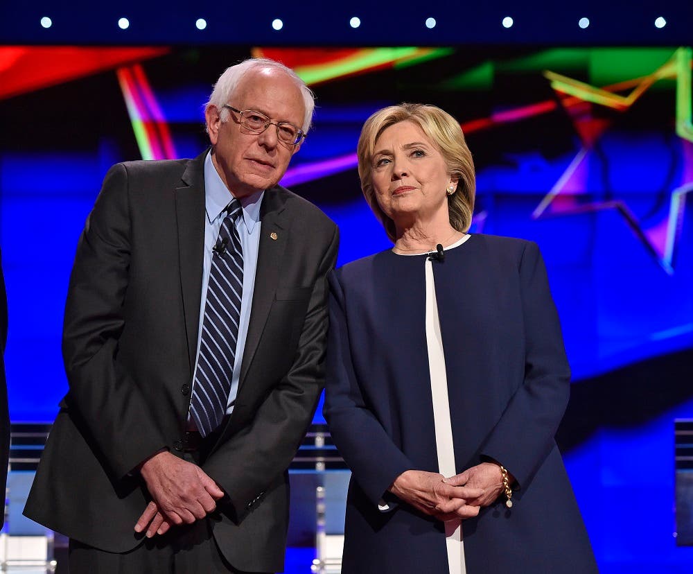 Democratic presidential candidates from left, former Virginia Sen. Jim Webb, Sen. Bernie Sanders, of Vermont, Hillary Rodham Clinton, former Maryland Gov. Martin O'Malley, and former Rhode Island Gov. Lincoln Chafee take the stage before the CNN Democratic presidential debate Tuesday, Oct. 13, 2015, in Las Vegas.