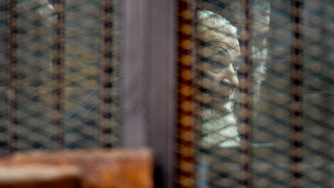 Brother of al-Qaida's deputy leader, Mohammed al-Zawahri stands in a defendants cage in the Police Academy courthouse in Cairo, Egypt, Monday, Aug. 10, 2015. AP