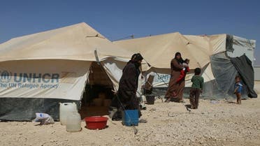 Syrian refugees hang out by their tents at the U.N.-run Zaatari refugee camp near Mafraq, northern Jordan. (AP Photo)
