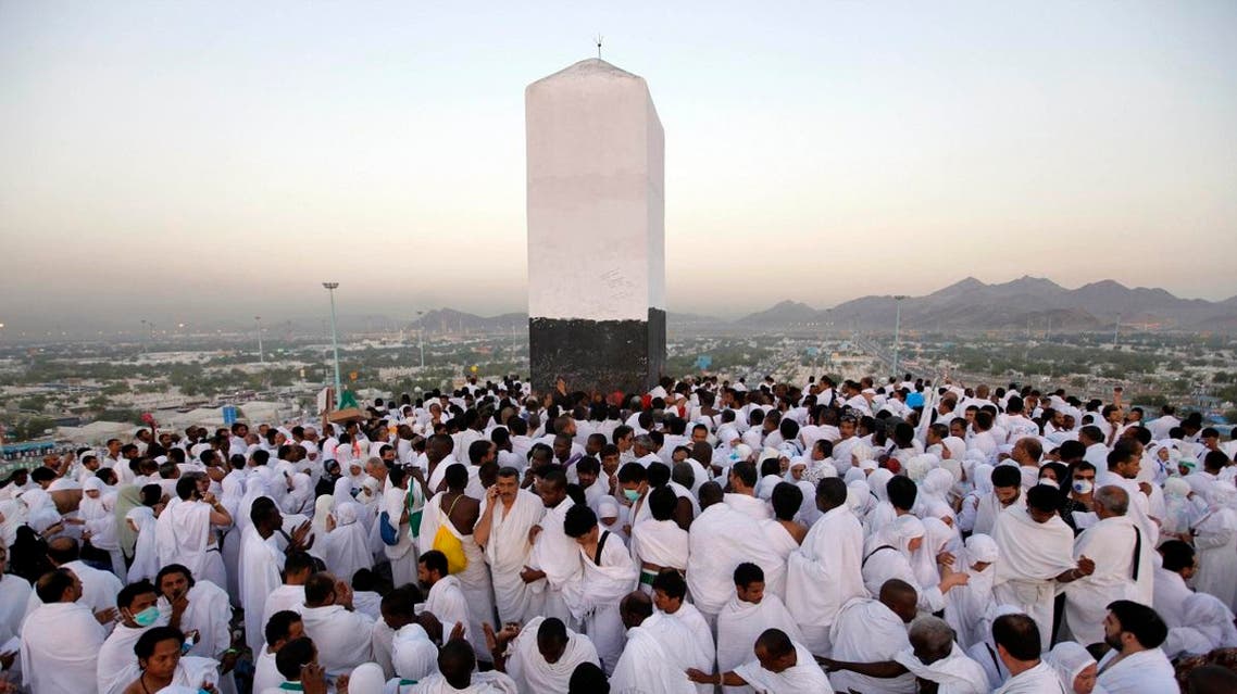 Muslim pilgrims pray on a rocky hill called the Mountain of Mercy, near the holy city of Makkah. (AP)