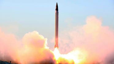 This picture released by the official website of the Iranian Defense Ministry on Sunday, Oct. 11, 2015, claims to show the launching of an Emad long-range ballistic surface-to-surface missile in an undisclosed location. Iran successfully test fired a new guided long-range ballistic surface-to-surface missile, state TV reported on Sunday. It was the first such a test since Iran and world powers reach a historical nuclear deal. Iran's Defense Minister Gen. Hossein Dehghan, told the channel that the liquid-fuel missile "will obviously boost the strategic deterrence capability of our armed forces." (Iranian Defense Ministry via AP)