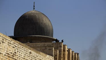 Israeli police officers take positions on the roof of al-Aqsa mosque during clashes with Palestinians. (File: Reuters)