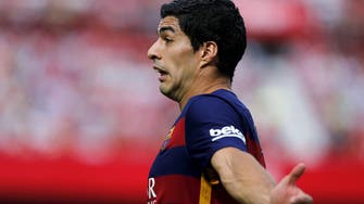 Barca’s Suarez foresees competitive title race