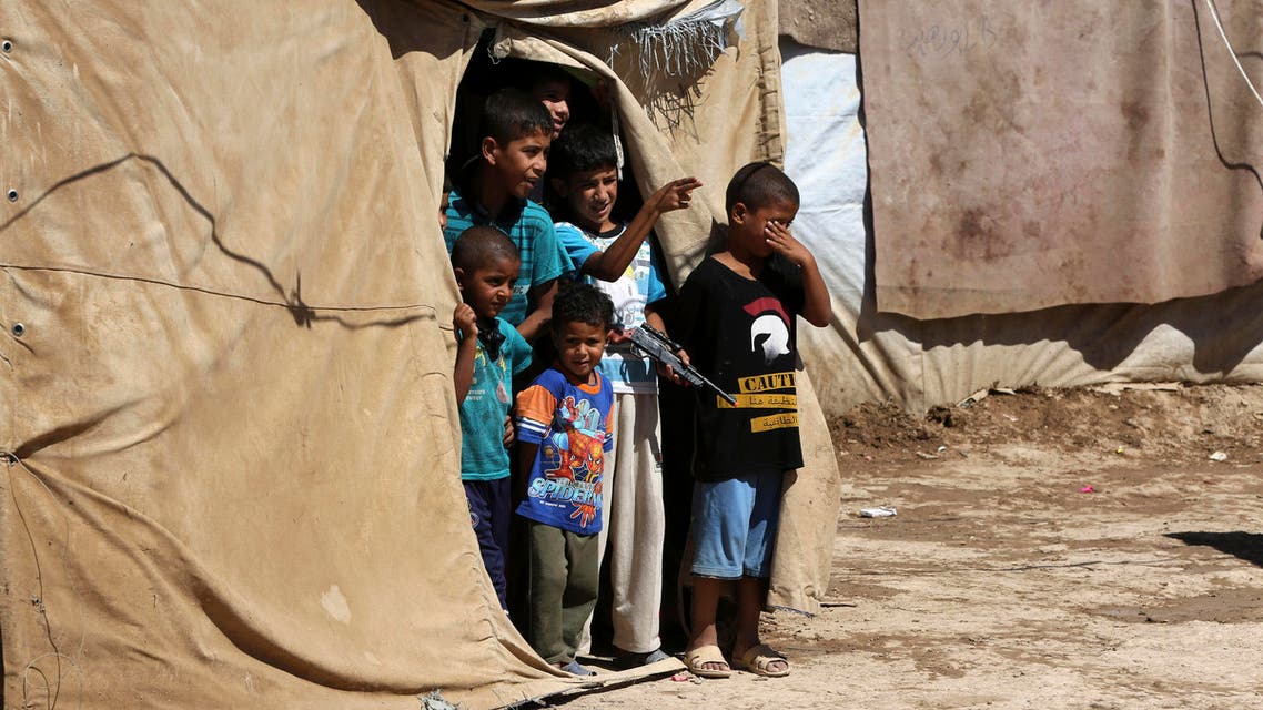 Internally displaced children play at al-Takia refugee camp in Baghdad, Iraq, Thursday, Sept. 24, 2015. (AP)