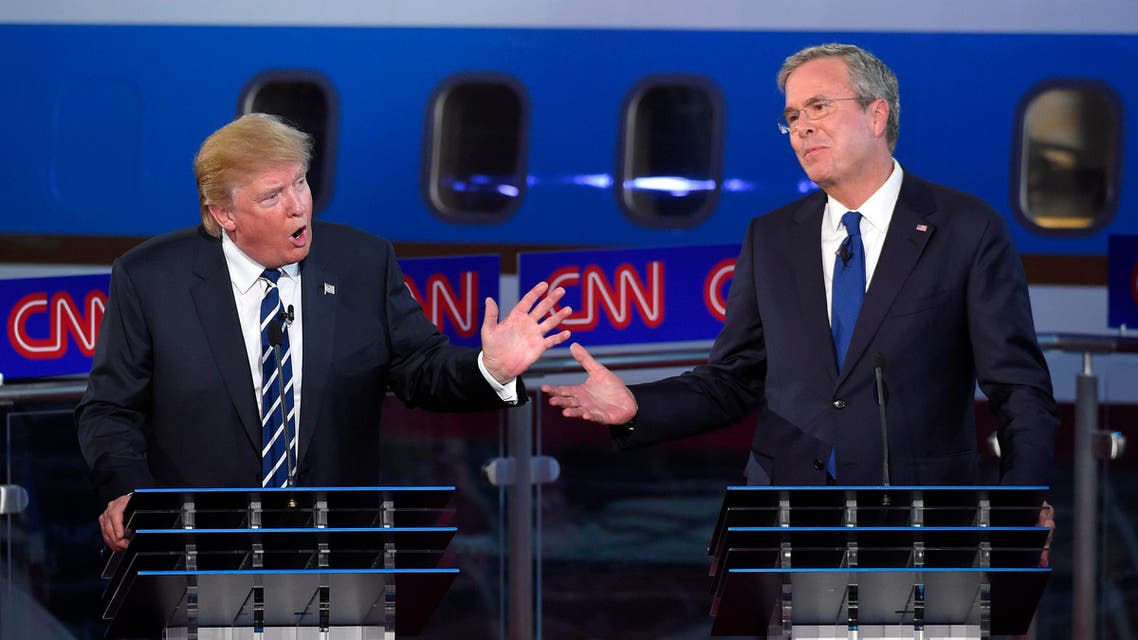 Republican presidential candidate Donald Trump, left, and former Florida Gov. Jeb Bush talk over each other during the CNN Republican presidential debate at the Ronald Reagan Presidential Library and Museum, Wednesday, Sept. 16, 2015,