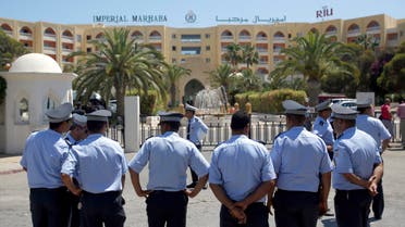  FILE - This Monday, June 29, 2015 file picture shows Tunisian police officers guarding Imperial Marhaba hotel during visit of top security officials of Britain, France, Germany and Belgium in Sousse, Tunisia. Spanish company RIU, which operated the Imperial Marhaba Hotel targeted in a deadly attack on the resort of Sousse in June, said Monday that it is in talks with owners of the 9 properties it currently operates in Tunisia about their future. The head of the Tunisian Hotel Federation, Radhouane Ben Salah, told the Associated Press that RIU’s decision was prompted by difficulty in marketing Tunisia as a tourist destination after the attacks, and that the hotels would close by Sept. 30. (AP Photo/Darko Vojinovic, File)