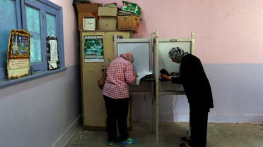 gyptian women cast their votes during the first round of Egyptian parliamentary elections, at polling center in Alexandria, Egypt, Sunday, Oct. 18, 2015. (AP