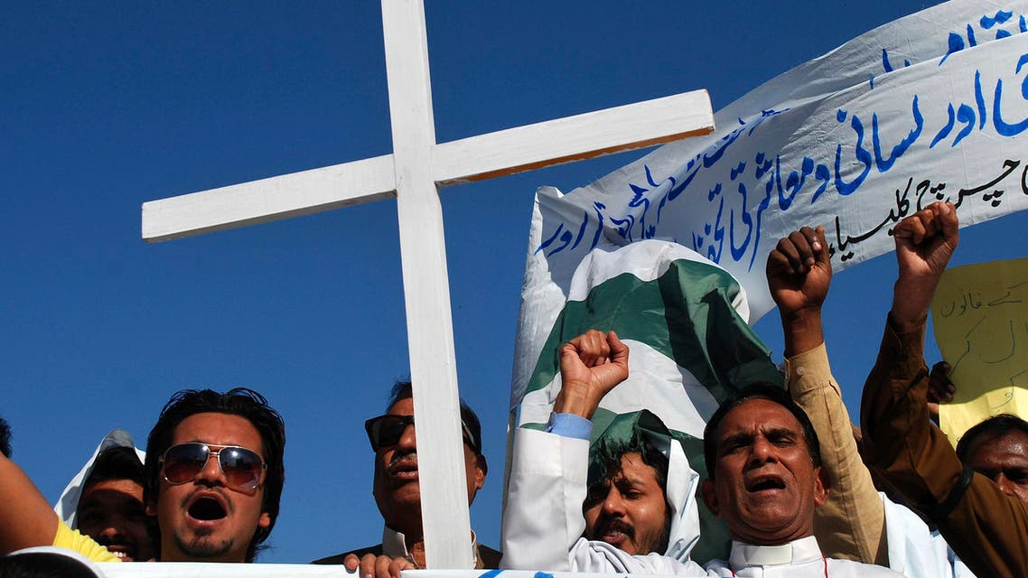 Pakistani Christians chant slogans during a demonstration to condemn the killing of a Christian couple, in Peshawar, Pakistan, Sunday, Nov. 9, 2014.