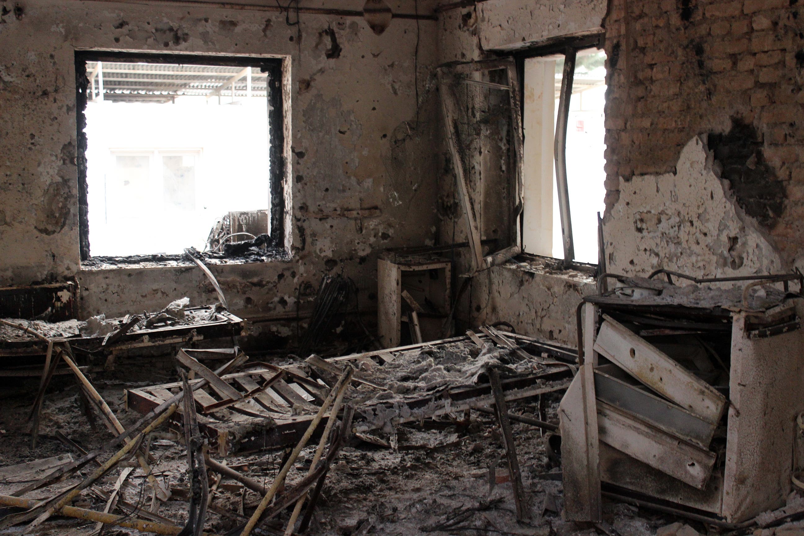 In this Friday, Oct. 16, 2015 photo, the charred remains of the Doctors Without Borders hospital is seen after it was hit by a U.S. airstrike in Kunduz, Afghanistan.