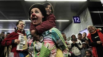 Smile, it's an emergency: clowning around with refugees