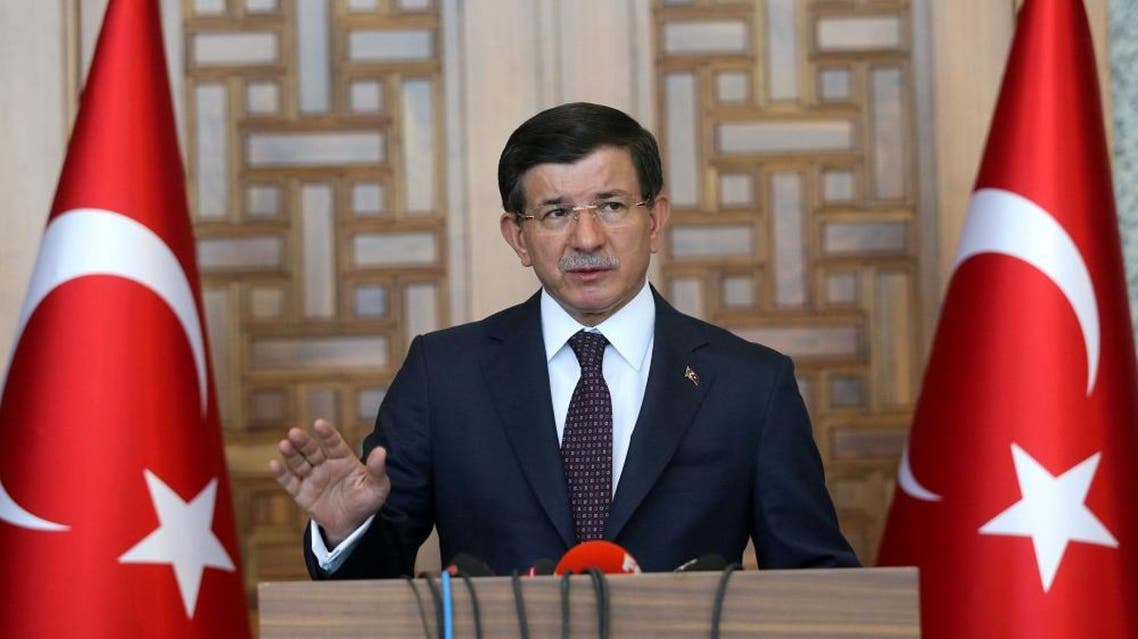 Turkish Prime Minister Ahmet Davutoglu speaks to the media in Ankara, Turkey, Friday, July 24, 2015. AP