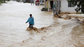 Rain deepens flood misery in the Philippines after typhoon kills 22