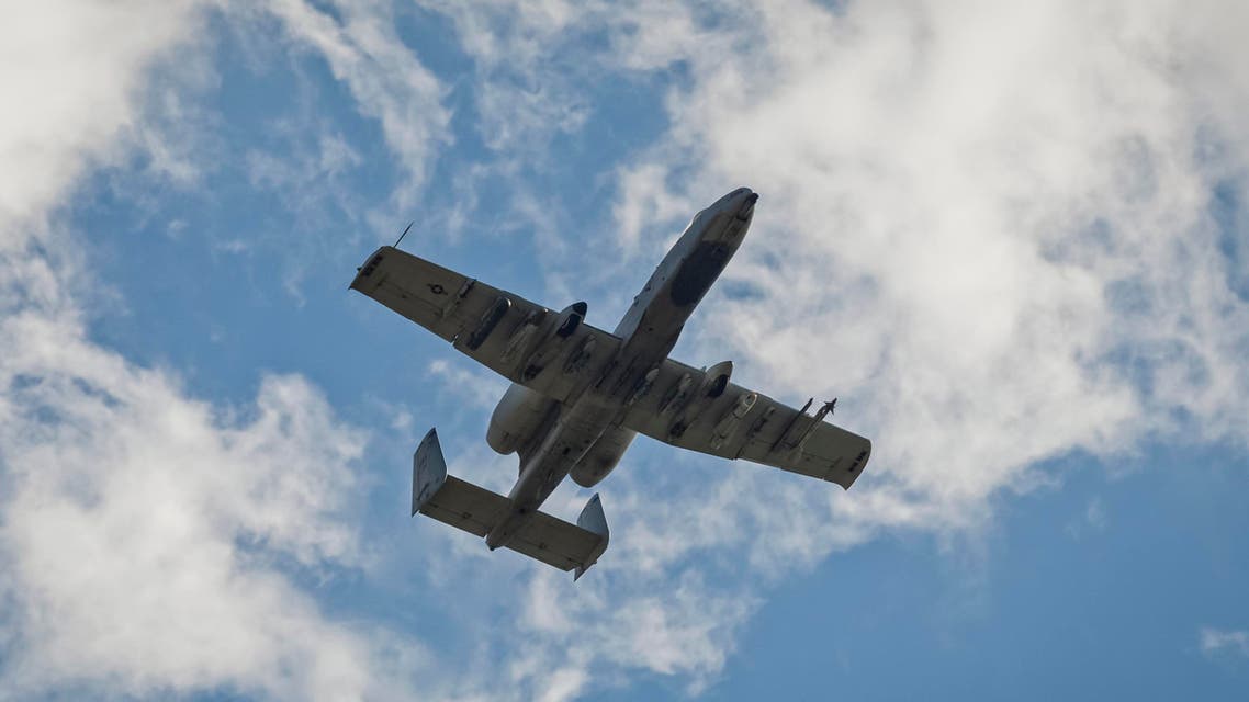 An US Air Force A-10 airplane flies above an airbase in Campia Turzii, in Romania's central region of Transylvania, Thursday, April 16, 2015, during a joint exercise with the Romanian air force. Romanian and US air teams conduct a joint military exercise dubbed Dacian Thunder 2015.(AP Photo/Mircea Rosca)