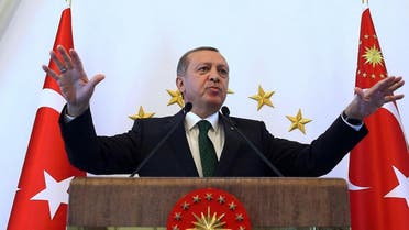  Turkish President Recep Tayyip Erdogan addresses people from southeastern Turkey, in Ankara, Turkey, Tuesday, Oct. 20, 2015. Critics accuse Erdogan of organizing rallies in Turkey and Europe to drum up votes for the ruling Justice and Development Party before Nov. 1 general elections, in breach of laws that require him to be neutral.(AP Photo/Presidential Press Service, Pool )