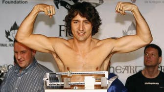 Photos of shirtless, muscle-flexing new Canadian PM eclipse policy talk