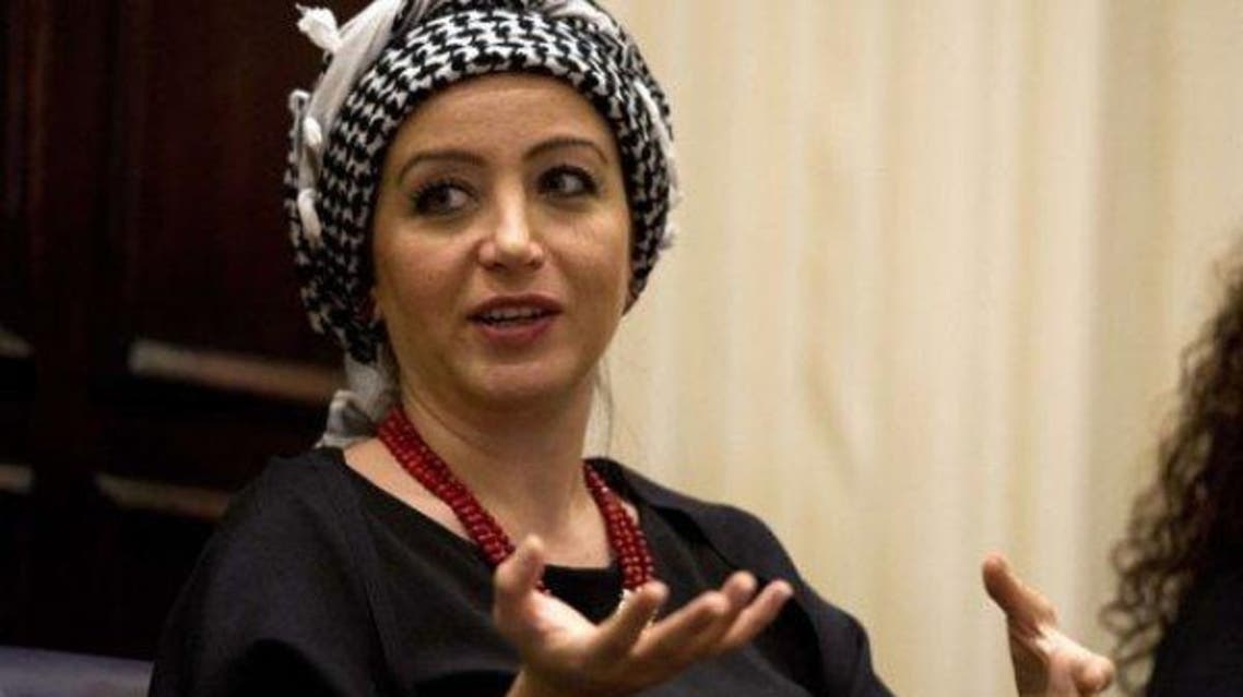 Syrian journalist Zaina Erhaim takes part in a panel discussion after receiving the 2015 Peter Mackler award at the National Press Club. (AFP)