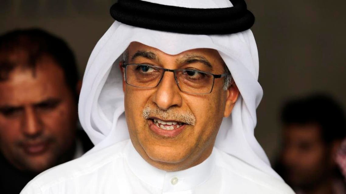 Asian Football Confederation President Sheikh Salman bin Ebrahim Al Khalifa leaves the AFC Congress in Manama, Bahrain, Thursday, April 30, 2015. Sheikh Salman, who stood unopposed, was re-elected by acclamation for a four-year term until 2019. (AP Photo/Hasan Jamali)