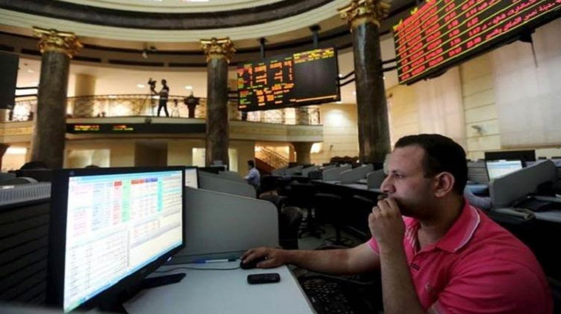 A trader works at the Egyptian stock exchange in Cairo, August 23, 2015. (Reuters)