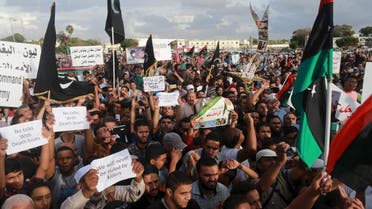 People take part in a protest against candidates for a national unity government proposed by U.N. envoy for Libya Bernardino Leon, in Benghazi, Libya October 23, 2015. REU