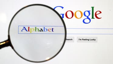  Google search page is seen through a magnifying glass in this photo illustration taken Tuesday in Berlin. Google Inc. is changing its operating structure by setting up a new company called Alphabet Inc., which will include the search business and other units.(Reuters)