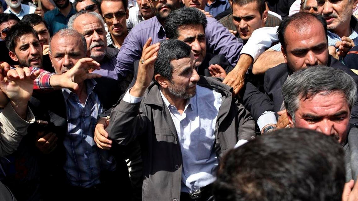 Escorted by his bodyguards, Iranian President Mahmoud Ahmadinejad waves to his well wishers at a pro-Palestinian rally in Tehran. (File photo: AP)