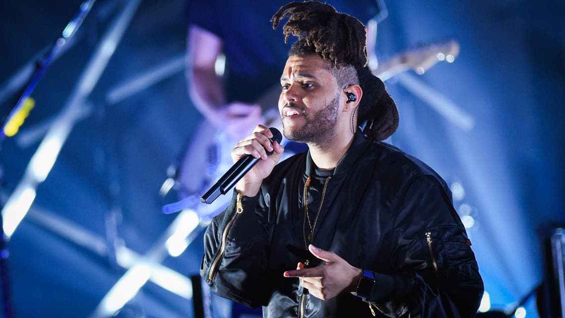 Recording artist The Weeknd performs at the 2015 Billboard Hot 100 Music Festival at Nikon at Jones Beach Theater on Saturday, Aug. 22, 2015, in Wantagh, N.Y. 