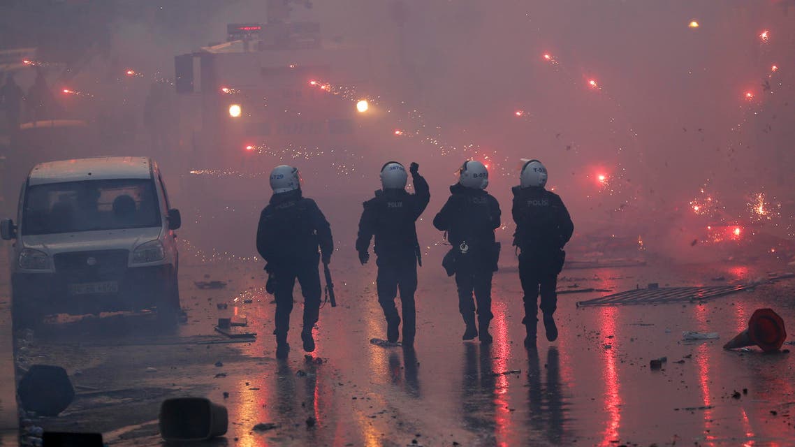 Fireworks thrown by anti-government protesters explode near riot policemen during a demonstration in Istanbul March 12, 2014. (Reuters)
