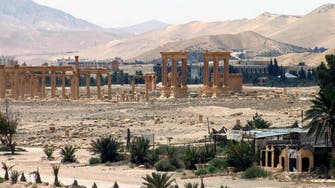 ISIS executes three in Palmyra, destroys ancient columns