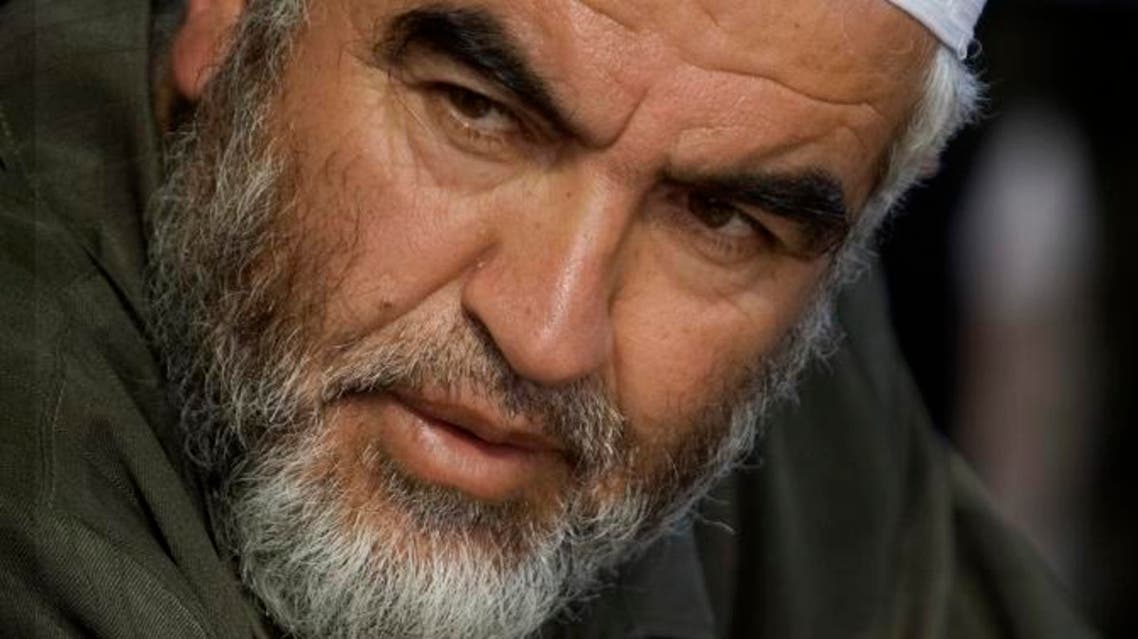 In this July 13, 2009 file photo Sheik Raed Salah, the leader of the Islamic Movement in Israel, during a press conference in the east Jerusalem neighborhood of Sheikh Jarrah. Britain's interior minister Theresa May said, Wednesday, June 29, 2011, an urgent inquiry is under way after Salah was able to travel to the U.K. despite being banned from entering the country, and was detained late Tuesday by police and is expected to be deported. (AP Photo/Sebastian Scheiner, file)