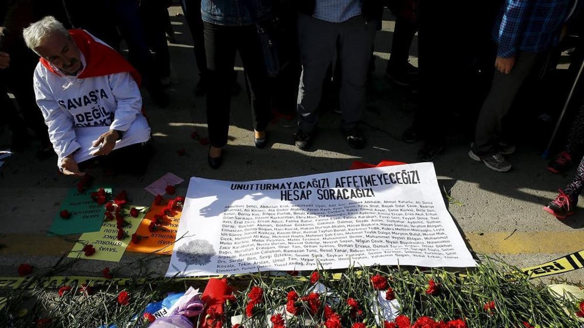 A man prays as he and others attend a commemoration for the victims of the October 10 bombings in Ankara, Turkey, October 17, 2015. REU