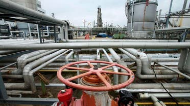 Pipes and valves are pictured at the refinery of Austrian oil and gas group OMV in Schwechat, Austria, October 21, 2015. Oil majors are expected to post the worst set of earnings since the onset of the sector's downturn, with writedowns likely to dominate headlines as companies respond to a further drop in the price of crude in the third quarter. Between October 26 and November 12 the world's top listed oil and gas producers will reveal just how badly they've been hurt by the 17 percent quarter-on-quarter fall in prices. REUTERS/Heinz-Peter Bader
