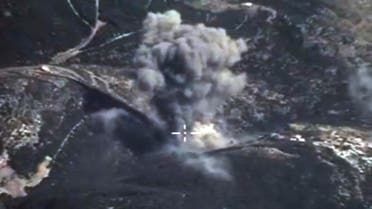 In this photo made from the footage taken from Russian Defense Ministry official web site on Sunday, Oct. 4, 2015, an aerial view of a bomb explosion in Syria.  AP 