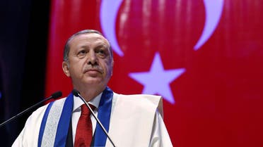 In this late Saturday, Oct. 24, 2015 photo made available Sunday,Turkish President Recep Tayyip Erdogan addresses after being presented with an honorary doctorate by private Kalyoncu University in Gaziantep, Turkey. (AP)