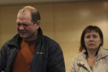 Relatives of victims of a Russian airliner which crashed in Egypt, mourns at a hotel near Pulkovo airport in St. Petersburg, Russia, October 31, 2015. The Airbus A321, operated by Russian airline Kogalymavia under the brand name Metrojet, carrying 224 passengers and crew crashed in Egypt's Sinai peninsula on Saturday after losing radar contact and plummeting from its cruising altitude, killing all aboard. REUTERS/Peter Kovalev