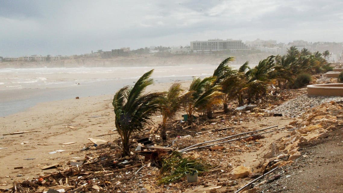 Debris is strewn on the beach as high winds, the remnants of Cyclone Gonu, whip up spray in the sea, in Muscat, Sultanate of Oman, Saturday, June 9, 2007. Cyclone Gonu romped through the tidy Omani capital on Thursday before heading north across the Gulf of Oman and hitting Iran. At the height of the storm in Oman, winds swept up to 95 mph (153 kph), according to the U.S. military's Joint Typhoon Warning Center. Oman's weather center said that Gonu was believed to be the strongest and deadliest storm to strike Oman since 1977, when 500 people were killed. (AP Photos/Hamid Al-Qasmi)