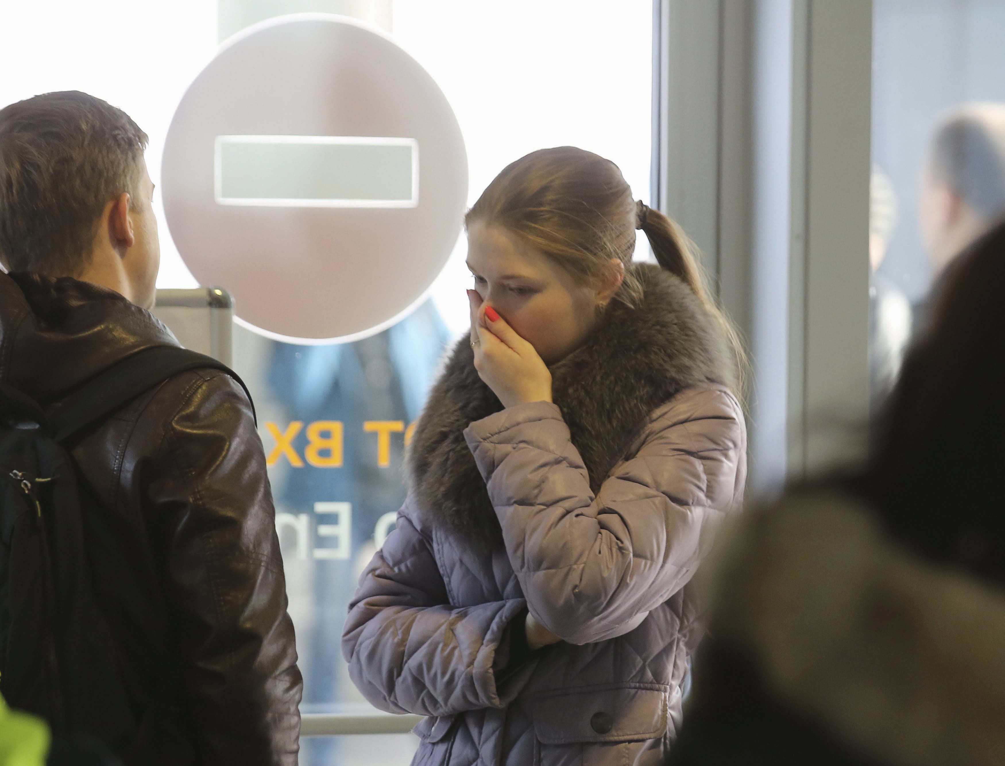 A woman reacts at Pulkovo airport in St. Petersburg, Russia, October 31, 2015. (Reuters)