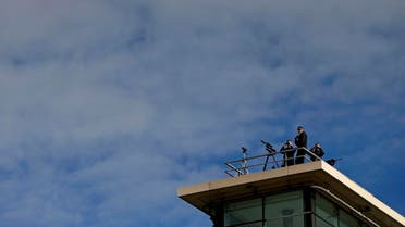 Armed police officers keep watch from the roof of an building in Manchester, Britain. (File: Reuters)